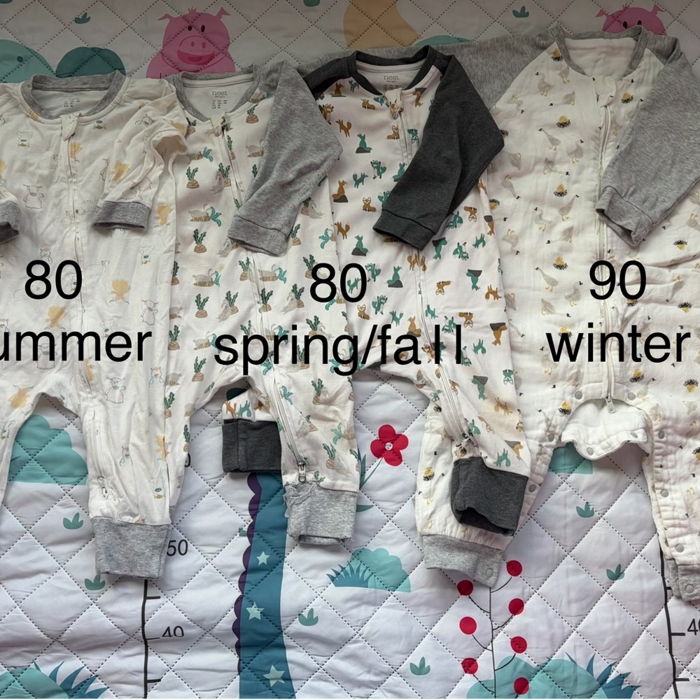 a set of 4 NEST DESIGN sleeping bags